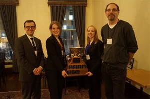 Arnup Cup winners from University of Toronto Faculty of Law, Anna Cooper and Ryann Atkins, with coaches Rob Centa and Jonathan Shime.